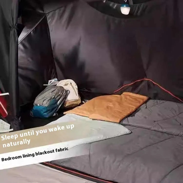 Inflatable 4-person camping tent with rainfly and hand pump for outdoor use