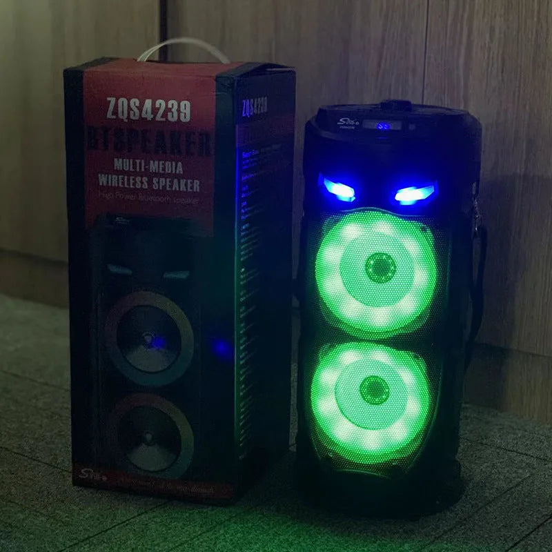 Black portable Bluetooth speaker with dual horn design and card slot