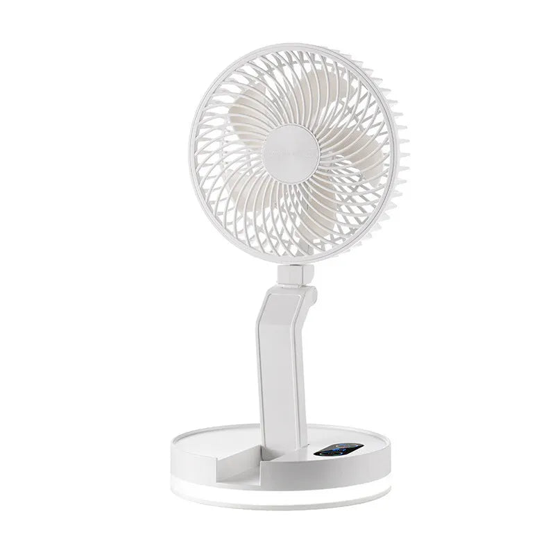 White folding USB rechargeable fan with 7 blades and remote control placed on a table
