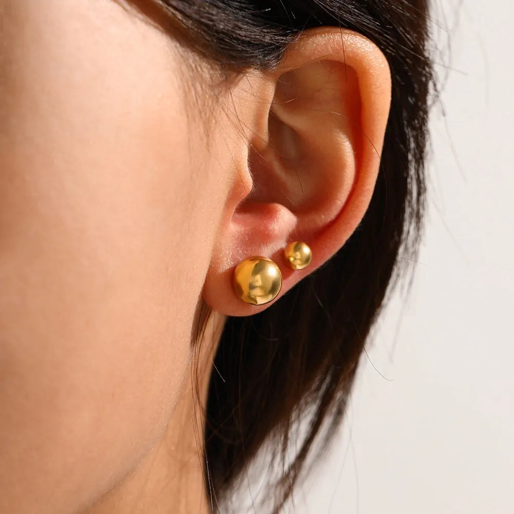 Simple stainless steel stud earrings geometric sphere design available in gold and steel colours multiple sizes