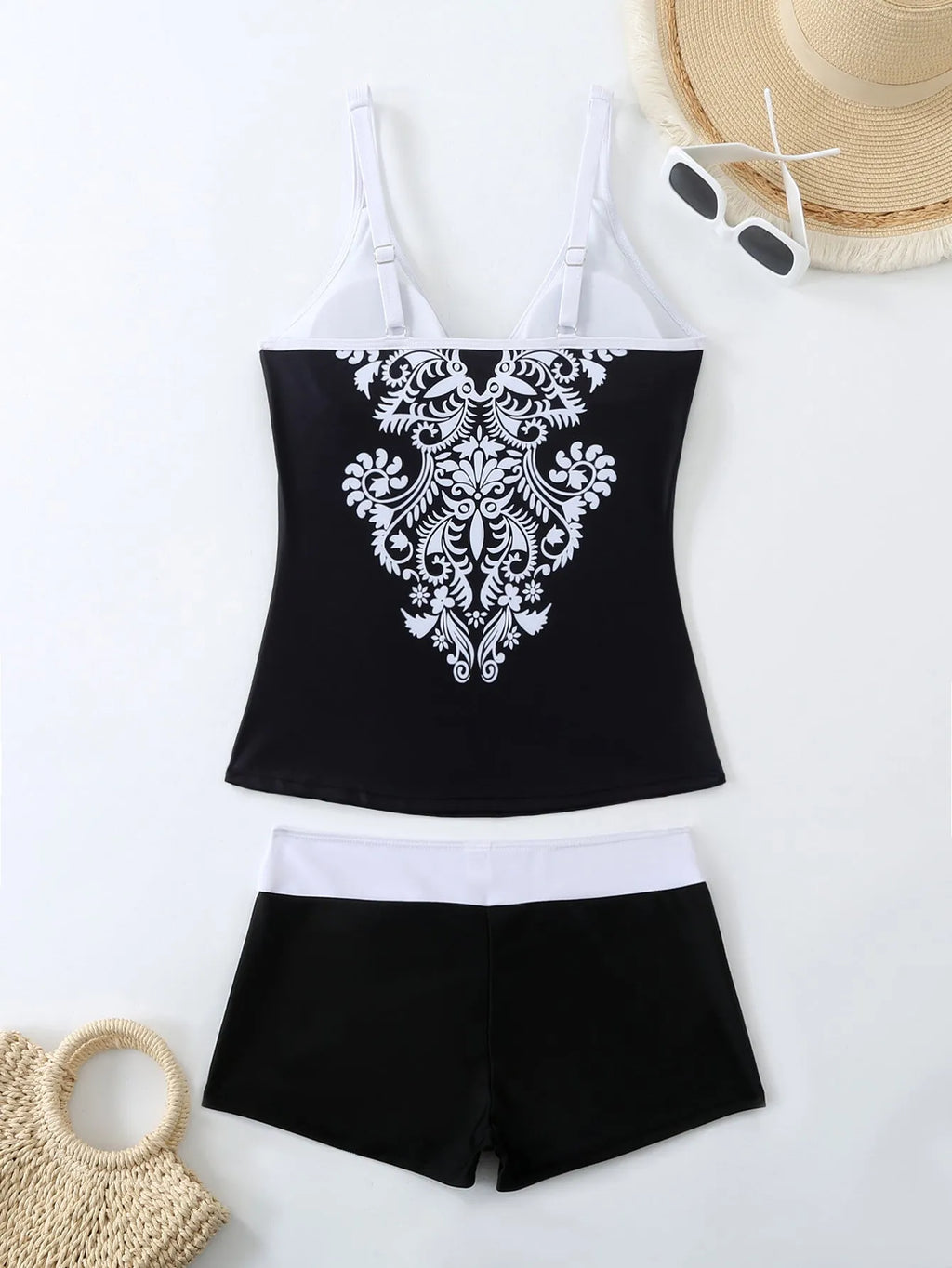 Plus size women's swimsuit set with printed briefs in black or rose red with matching swimming trunks