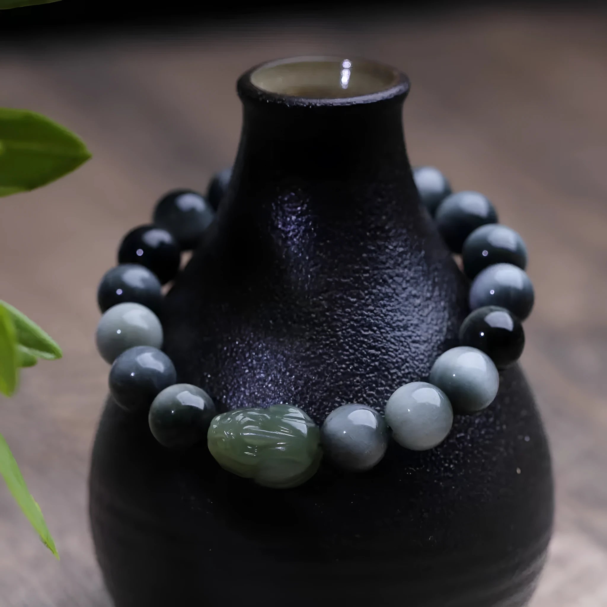 Black 10mm eagle eye stone and Hetian jade Pixiu bracelet with manual craftsmanship details