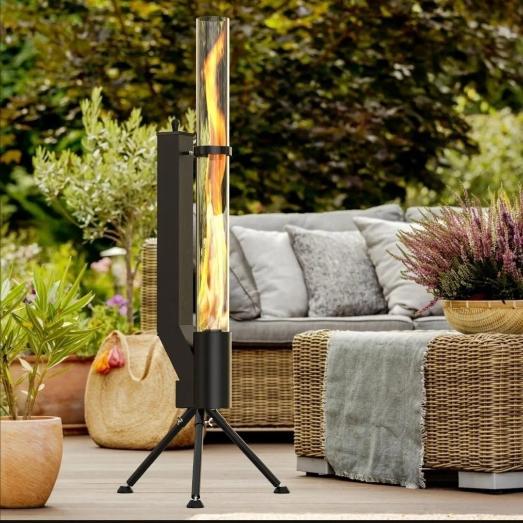 Vertical iron wood burning rocket furnace outdoor heating stove with visible flames