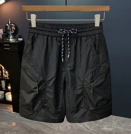 Man wearing loose-fit camouflage cargo shorts made from quick-dry cotton blend fabric