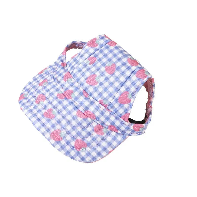 Pet baseball cap made of canvas with adjustable sizing, shown in a plaid pattern for sun protection