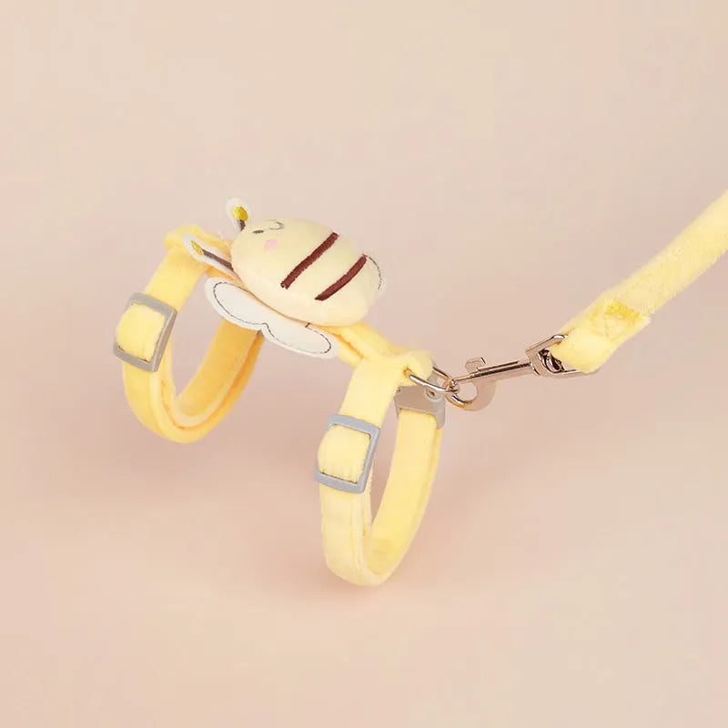 Colourful bee-shaped adjustable cat leash and harness set in pink, yellow, or blue.