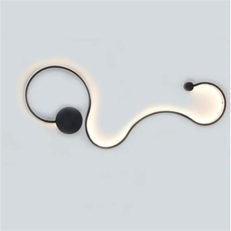 Modern LED wall lamp with aluminium shade in black finish, wall-mounted design for bedroom or corridor lighting