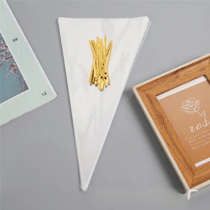 Transparent triangle-shaped plastic packaging bag with a metal tie wire attached for closure.