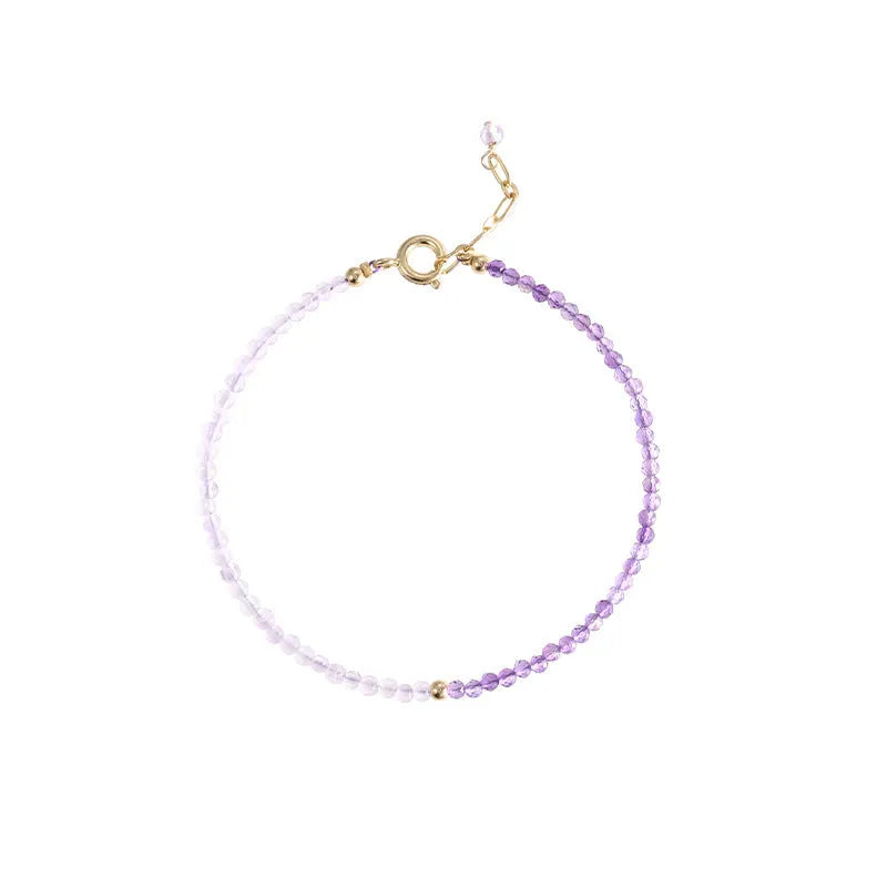 Close-up of a purple geometric rattan crystal bracelet with 2mm thickness and cut facets.