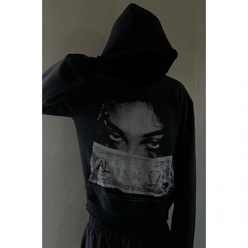 Black women's hoodie with cartoon pattern print, loose fit design