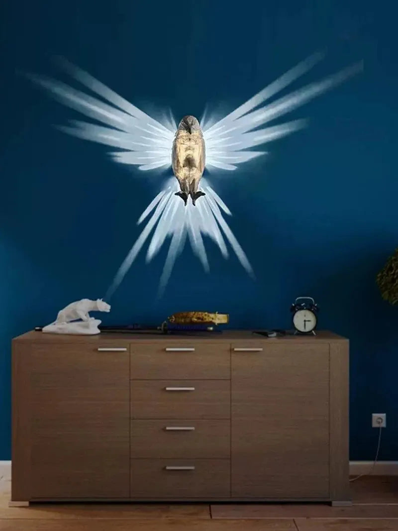 Eagle-shaped 3D printed resin wall lamp projecting a silhouette shadow on a wall.