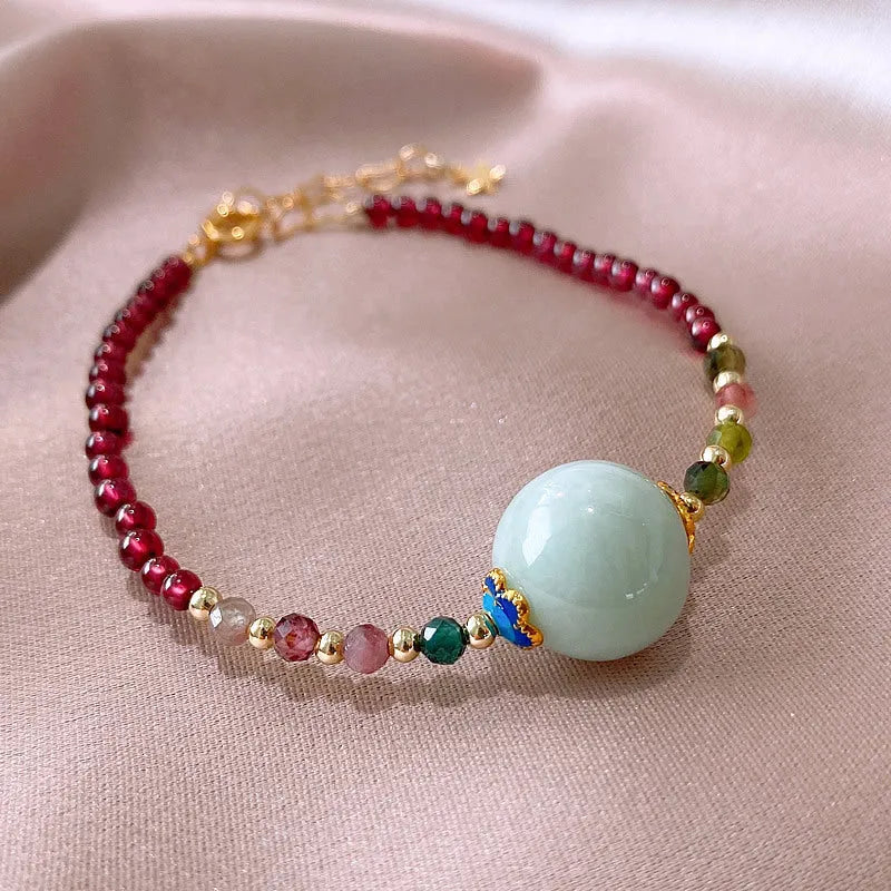 Aquamarine colour tourmaline bracelet with drop shape gemstones and Korean-style design