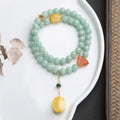 Close-up of a double-layer women's bracelet with jade round beads and beeswax barrel beads in a retro geometric design
