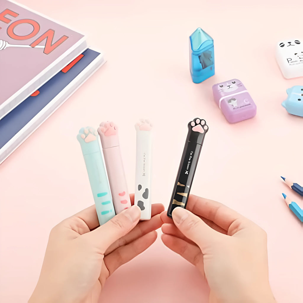 Cat paw design mini folding scissors in four colours showing stainless steel blades
