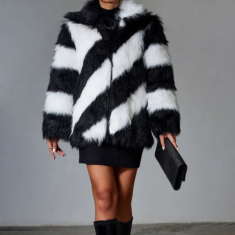 Women's faux fur coat with contrast colour lapels and a removable fur collar.