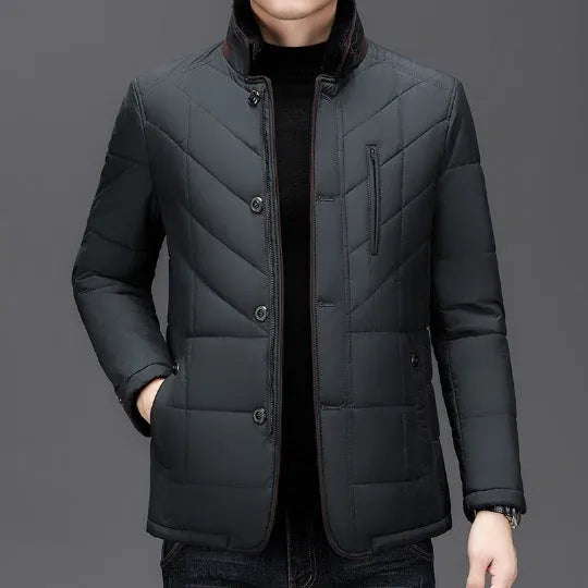 Men's dark blue short winter padded coat with side pockets on a mannequin
