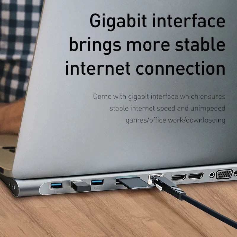 Aluminium USB-C docking station with cooling bracket showing ten ports including HDMI and VGA connections