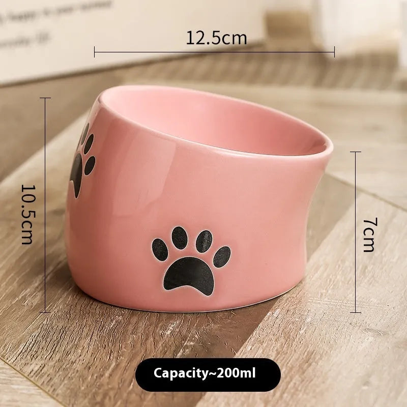 Ceramic cat bowl with high foot design in cat's paw pattern available in multiple colours