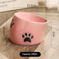 Ceramic cat bowl with high foot design in cat's paw pattern available in multiple colours