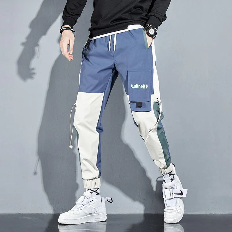 Men's polyester drawstring casual pants, K91 regular fit, blue colour, side view showing waist and leg