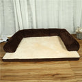 Corduroy dog bed with bolster sides in coffee colour on hardwood floor