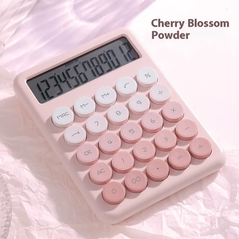 Desk calculator in a choice of violet, cherry blossom powder, glacier blue, and mint green gradient colours.