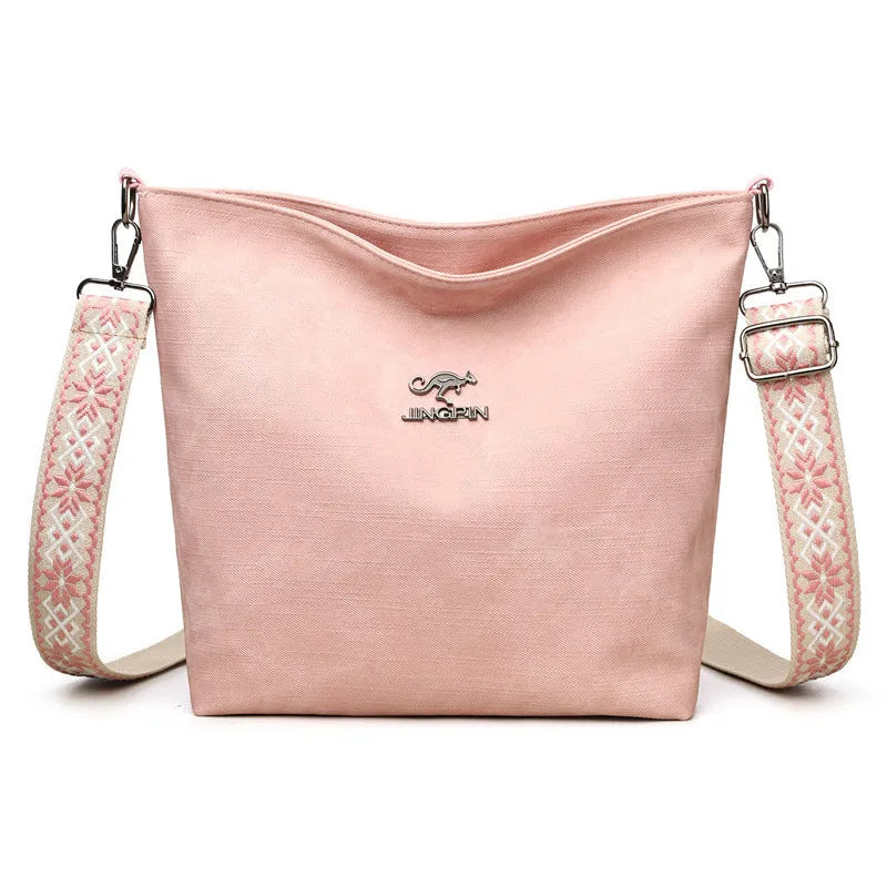 Soft PU shoulder bag in grey, pink, or yellow with adjustable strap and polyester lining