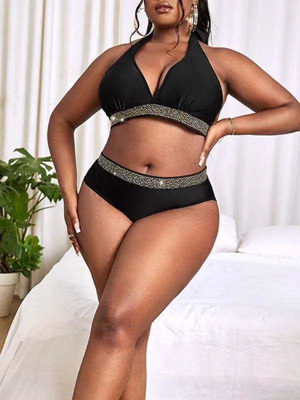 Plus size black women's two-piece bikini swimsuit on a hanger