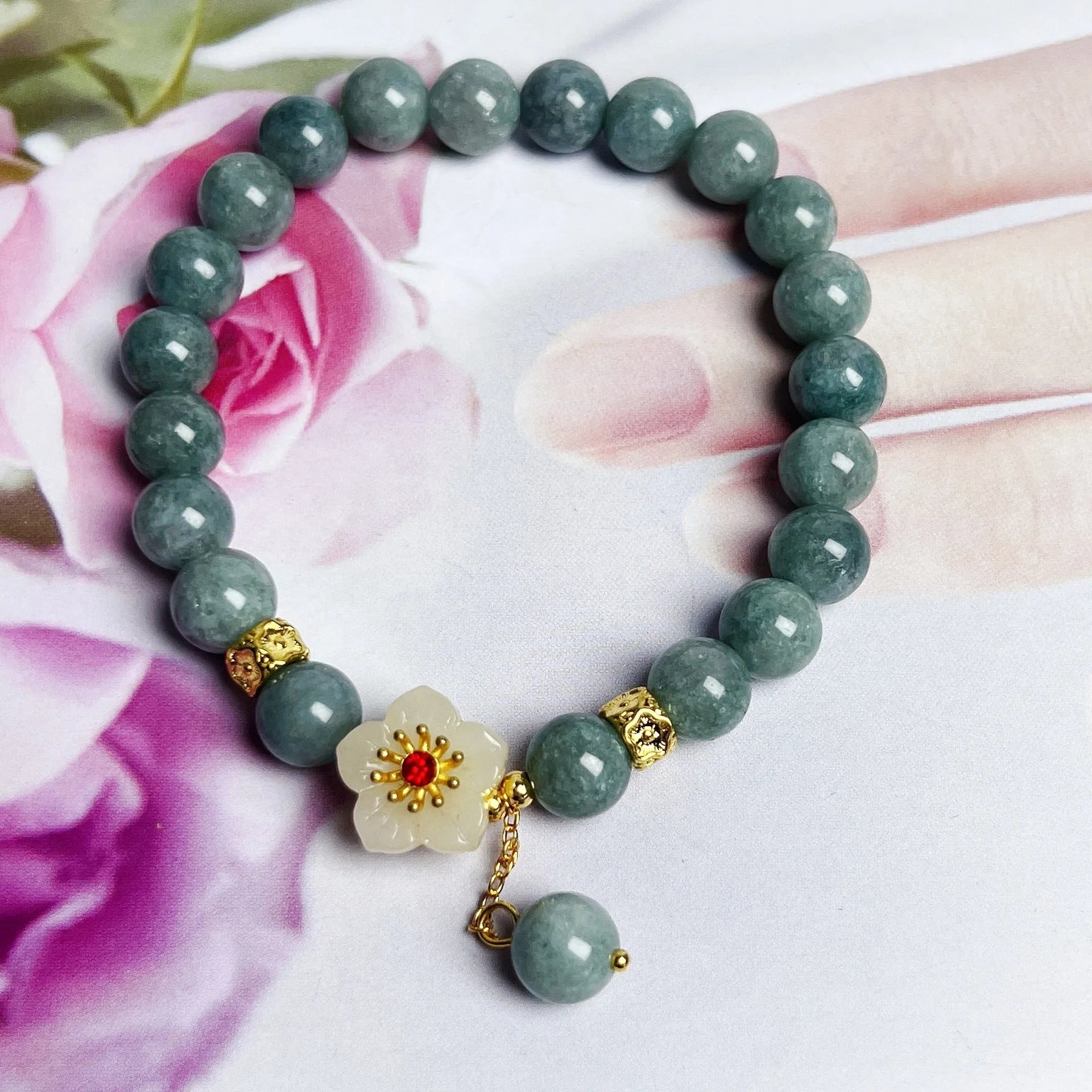 Women's handmade jade bracelet with adjustable rope fastening in retro style