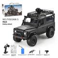 Four-wheel drive off-road RC car with controllable headlight and camera in black plastic