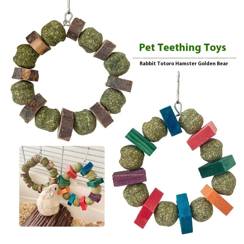 Hamster chew toy featuring applewood sticks and decorative straw balls with colourful sequins
