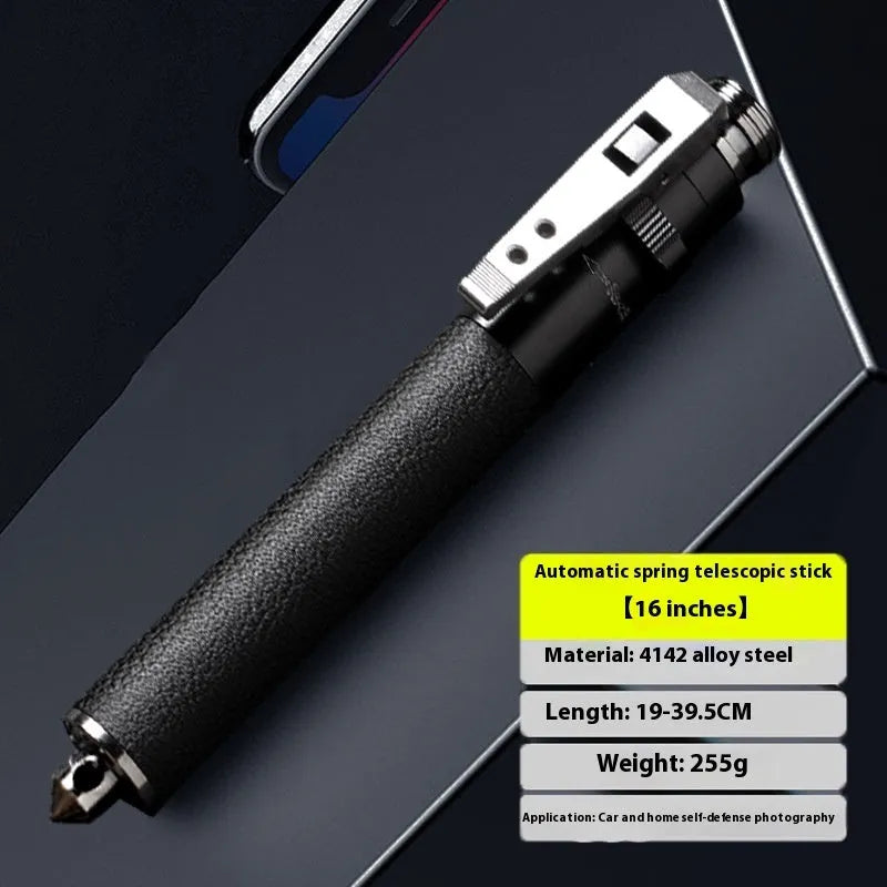 Titanium black aluminium alloy automatic spring expandable baton on dark background