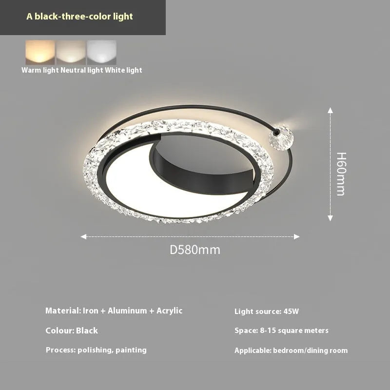 Modern round iron ceiling lamp in black finish mounted on a white ceiling.