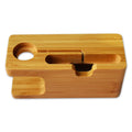 Bamboo carved phone stand with round carving design on office desk, 149mm tall smartphone holder