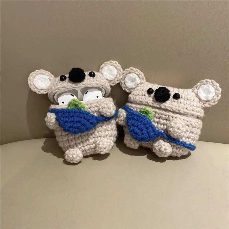 Hand knitted AirPods protective sleeve with koala bear backpack design on Apple AirPods case
