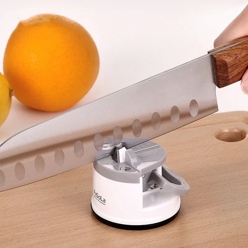 Fixed angle tungsten steel knife sharpener in mustard green with plastic body and arrow direction label