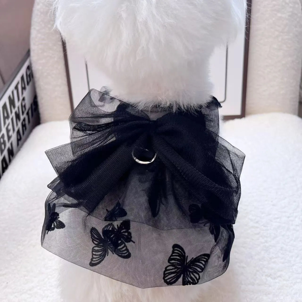 Black polyester princess tulle skirt for a small dog or cat, shown on a mannequin.