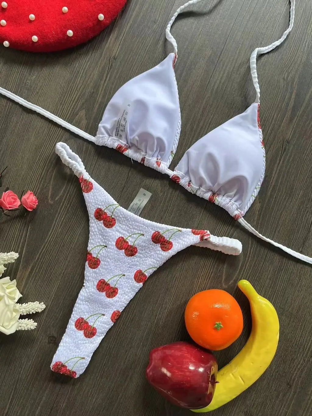 Women's printed nylon bikini with briefs style and cotton lining for swimming sports.