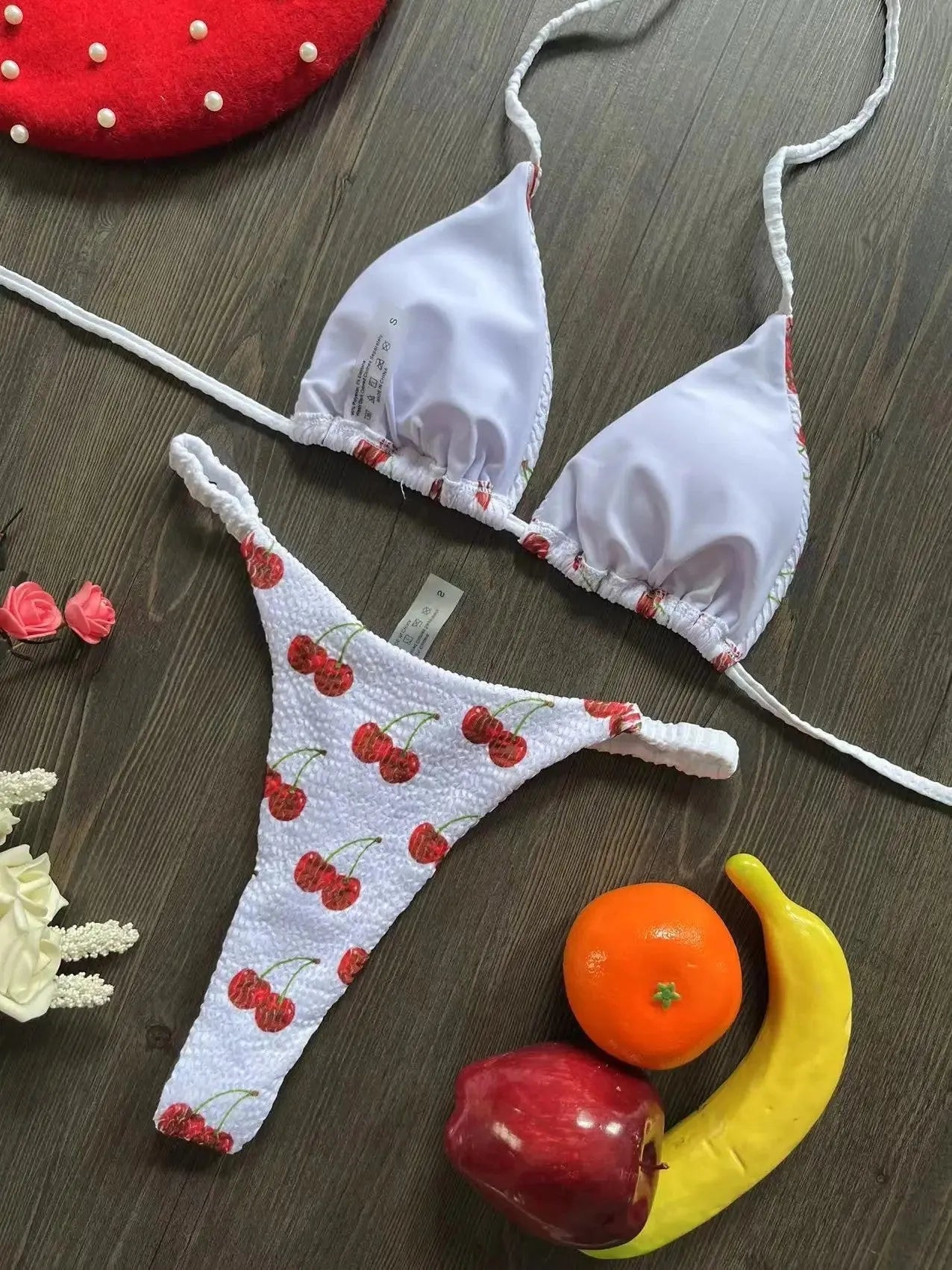 Women's printed nylon bikini with briefs style and cotton lining for swimming sports.