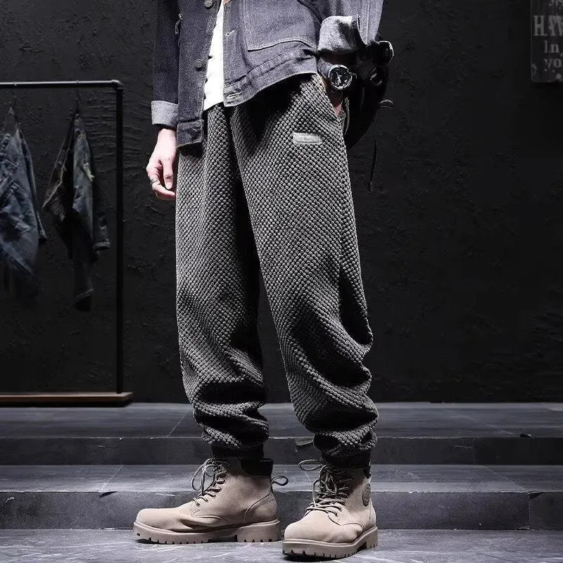 Men's grey ankle strap sweatpants with straight leg design and non-iron polyester blend fabric