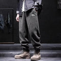 Men's grey ankle strap sweatpants with straight leg design and non-iron polyester blend fabric