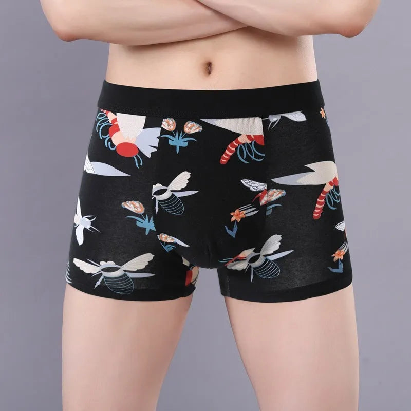 Men's floral print cotton boxer shorts showing the U-shaped pouch design and available colour variations.