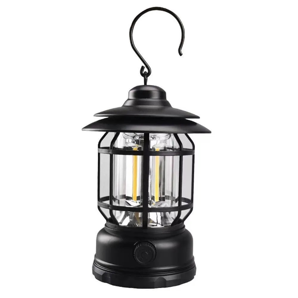 Dark green portable head lamp and camping lantern with dimensions 16.6x6.7x9.6 cm.