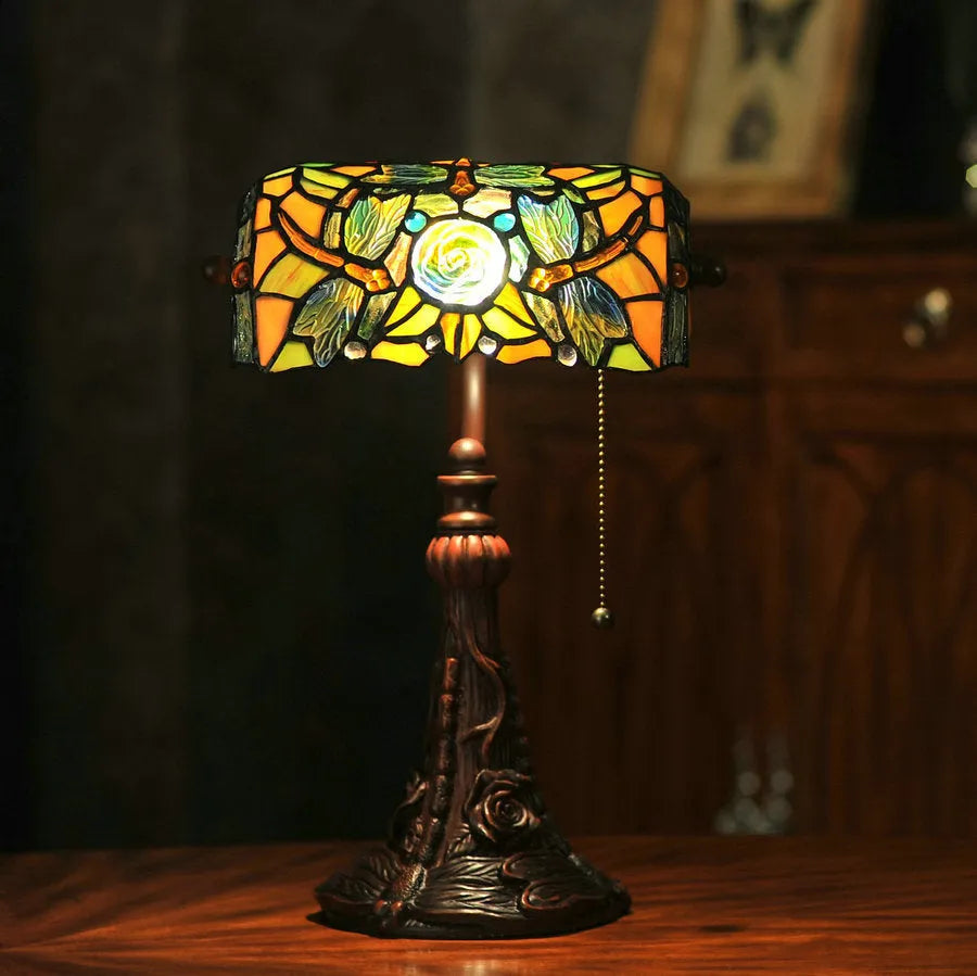 10-inch Tiffany table lamp with stained glass shade and resin base on a study desk