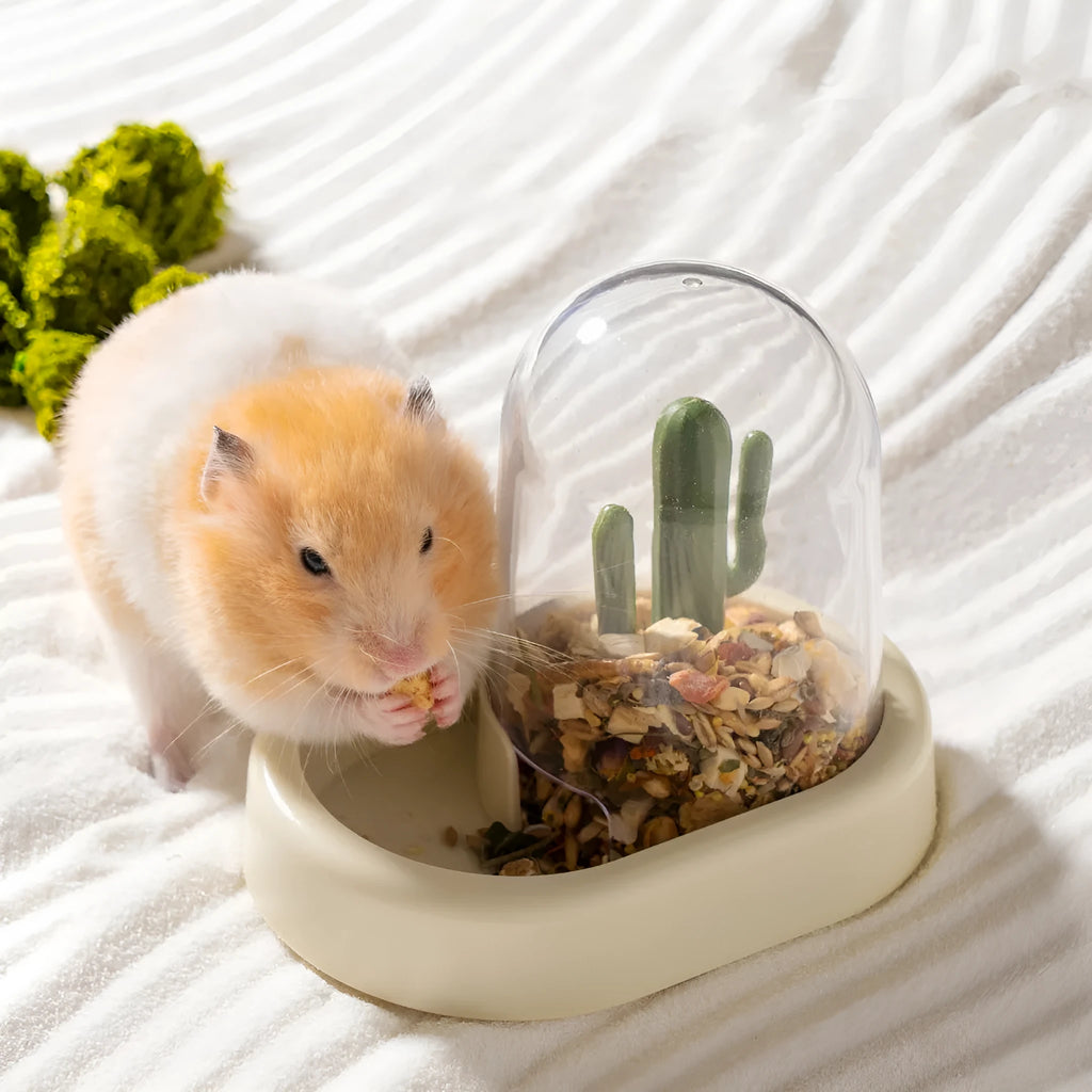 Hamster automatic cage feeder with transparent food window in vanilla yellow colour.