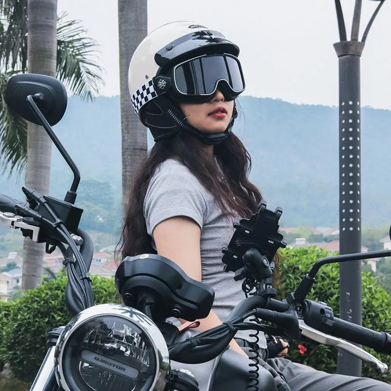 Retro style motorcycle helmet on a solid background, shown in a choice of ivory white, black, or grey.