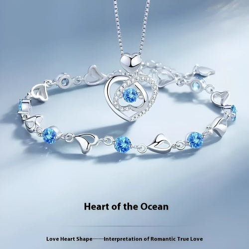 Blue heart necklace and bracelet jewellery set with diamond detailing on copper chains