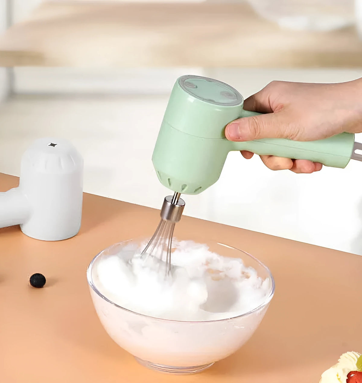 Portable mini wireless electric egg beater handheld USB rechargeable food mixer in green with two stainless steel stirrers