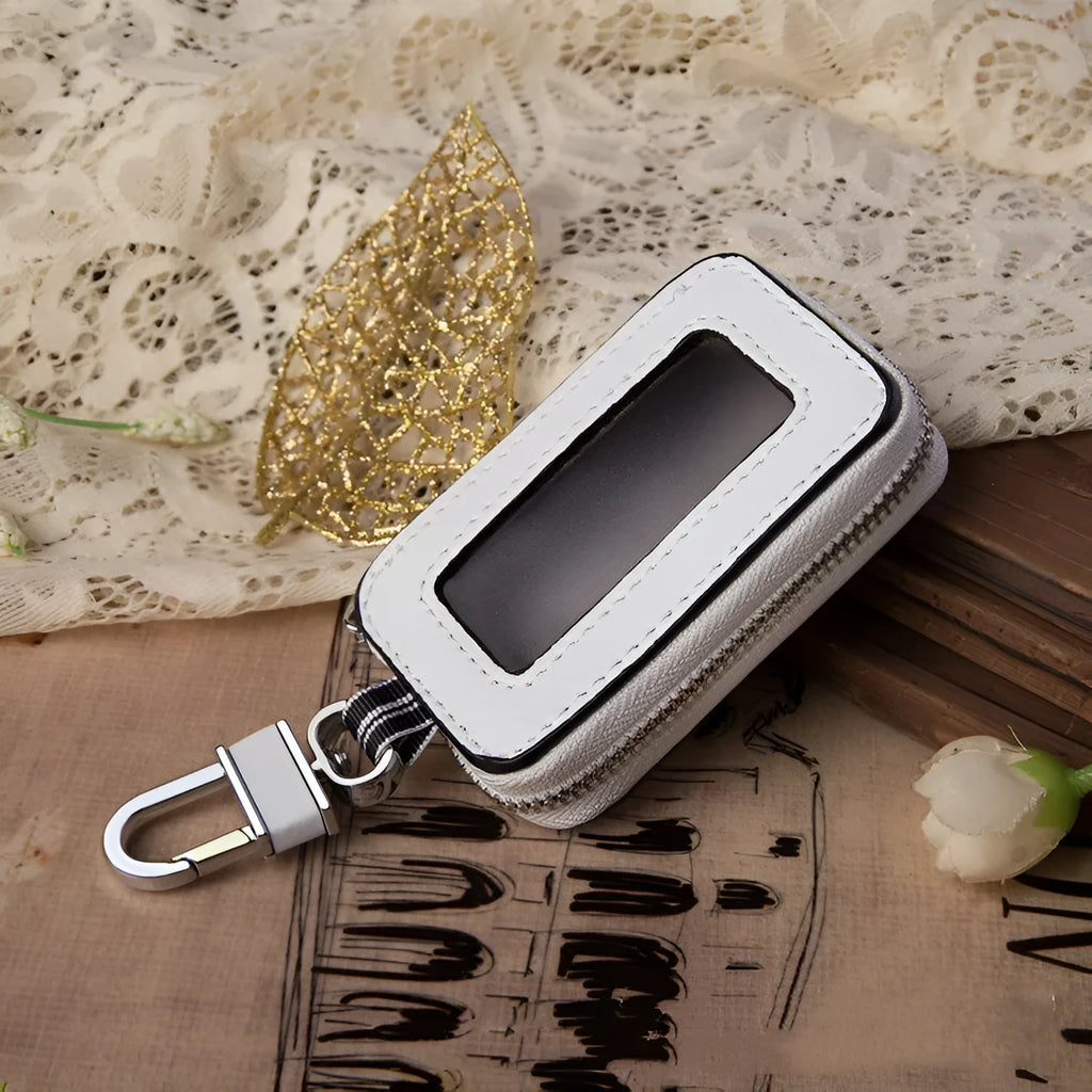 White genuine leather car key case with a plain weave pattern, shown in a square vertical design.