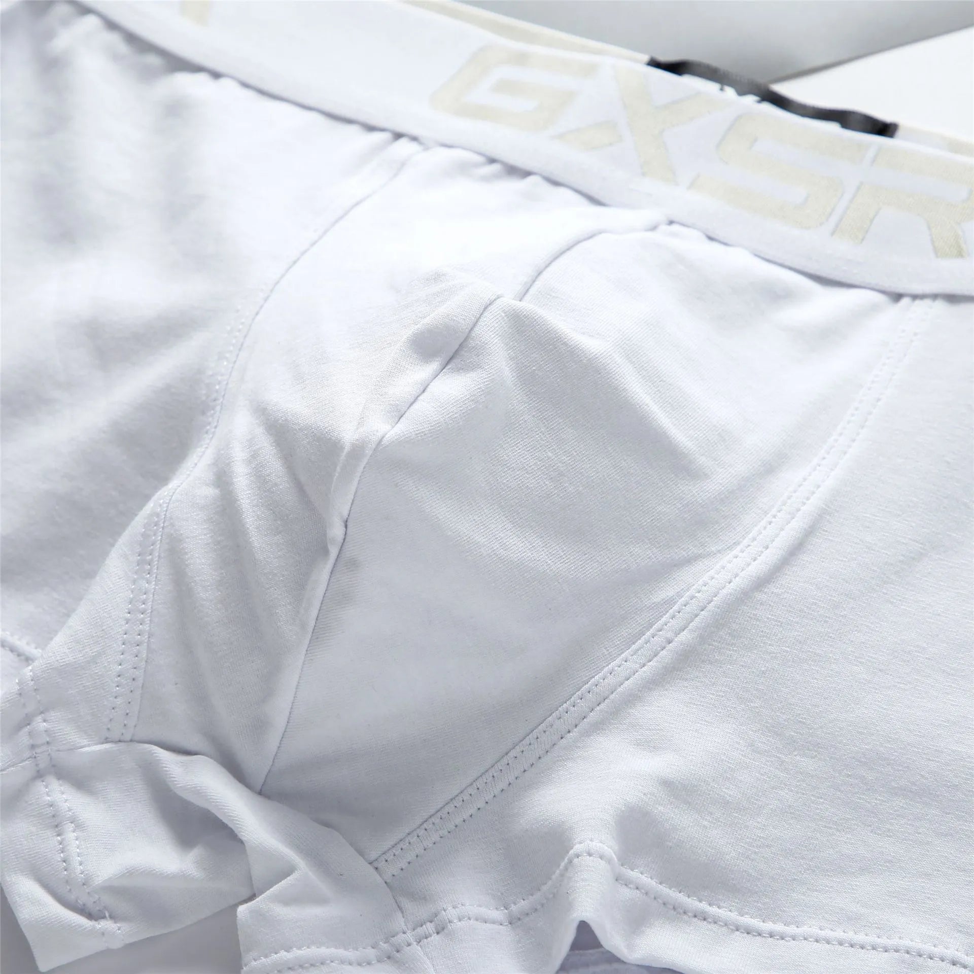 Men's purified cotton low waist boxers in solid colour available in black white and grey